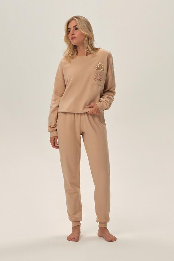 Dres damski z bawełny, idealny jako element codziennej stylizacji. Bluza z długim rękawem, dekolt półokrągły, spodnie długie. Dół bluzy, mankiety i nogawki zakończone ściągaczem. 
 
Skład: 100% Bawełna
 